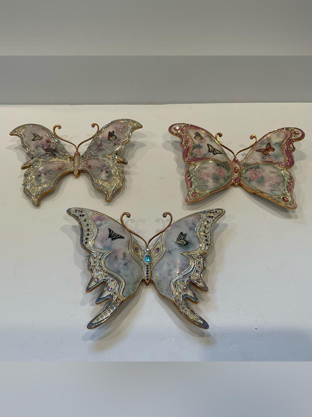 This is the "Enchanted Wings" porcelain butterfly wall plaque by artist Lena Liu